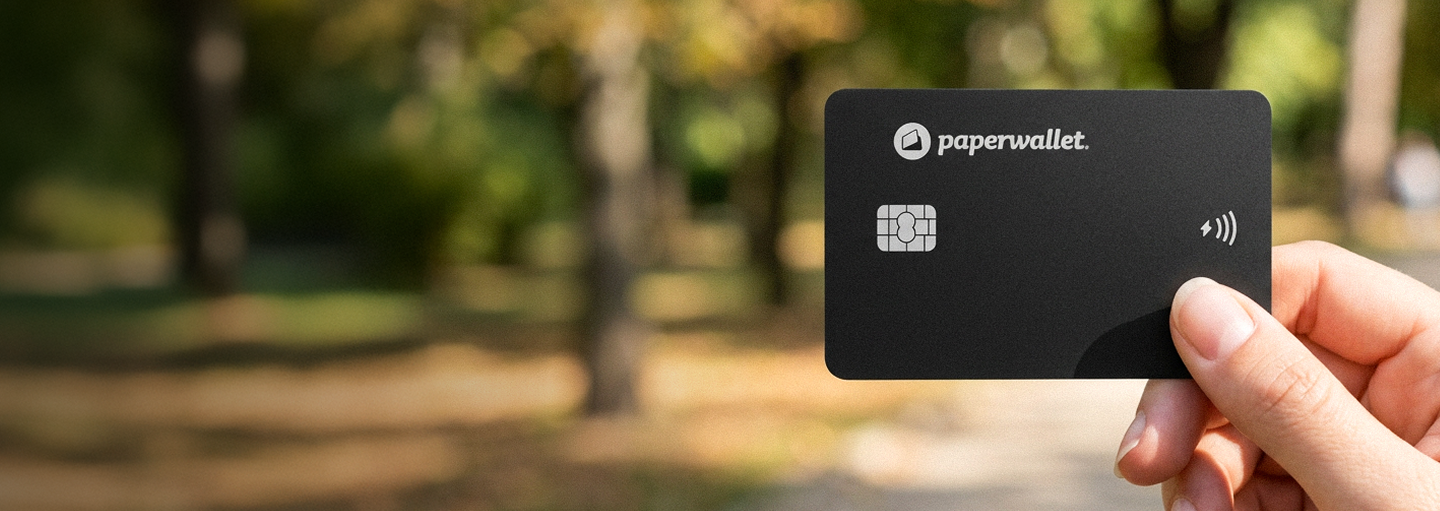 Paperwallet Finder Card held in front of a blurred outdoor background